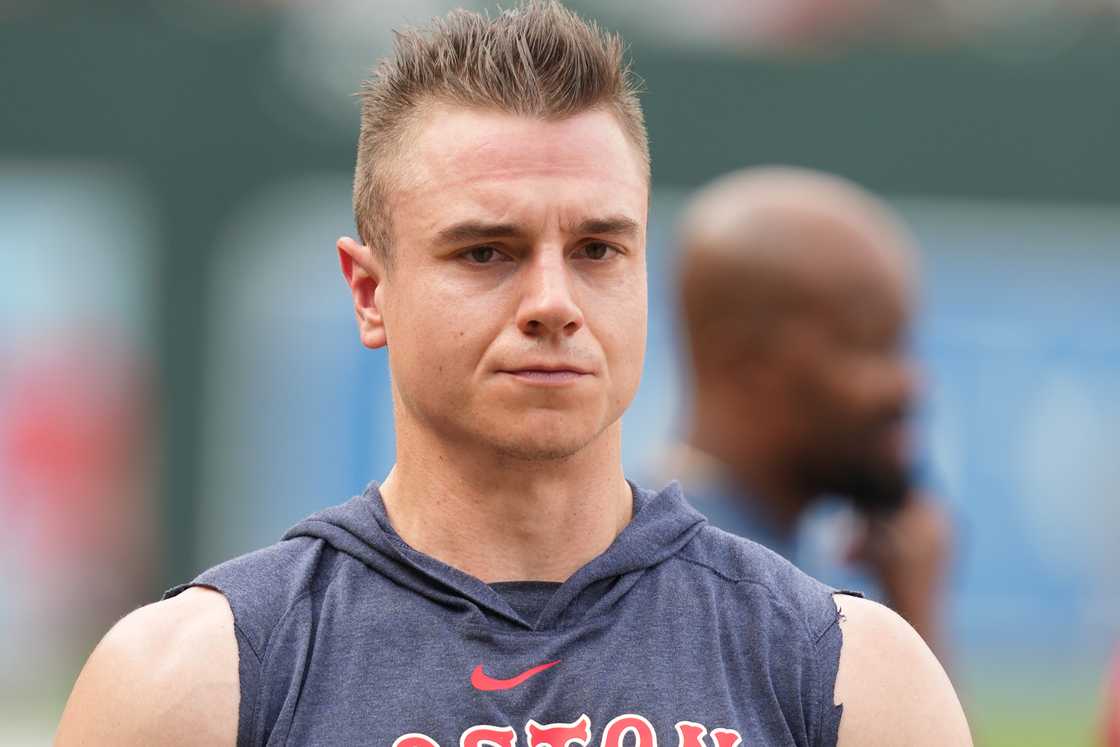 Tyler O'Neill looks on during batting practice before a baseball game