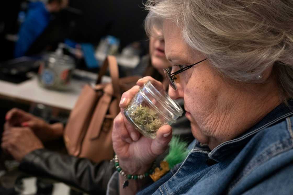Juree Burgett, who traveled from Kansas, smells various varieties of cannabis at a dispensary in Kansas City, Missouri -- a state where recreational pot use is now legal Juree Burgett, who traveled from Kansas, smells various varieties of cannabis at a dispensary in Kansas City, Missouri -- a state where recreational pot use is now legal