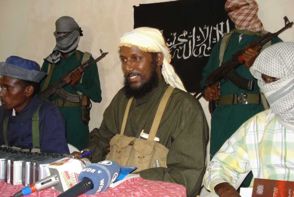 Muktar Robow (centre) defected from the Al-Qaeda-linked Al-Shabaab insurgents in August 2017 Muktar Robow (centre) defected from the Al-Qaeda-linked Al-Shabaab insurgents in August 2017