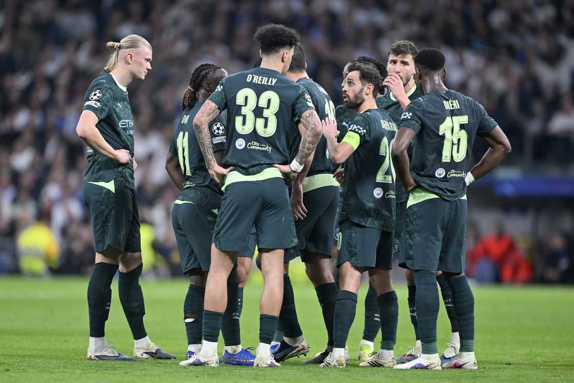 Man City squad news, Guardiola tactics vs. Real Madrid, Champions League clash, Man City Real Madrid prediction, Etihad Stadium match, City Madrid preview, Pep Guardiola Champions League record