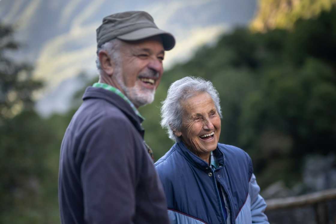 Romano Dado (l), a former local councillor, with fellow villager Bice Tonini