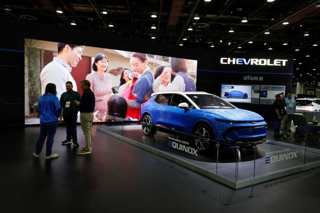 General Motors, which reported better than expected profits, is hopeful that the moderately priced Chevrolet Equinox will attract more consumers to electric vehicles