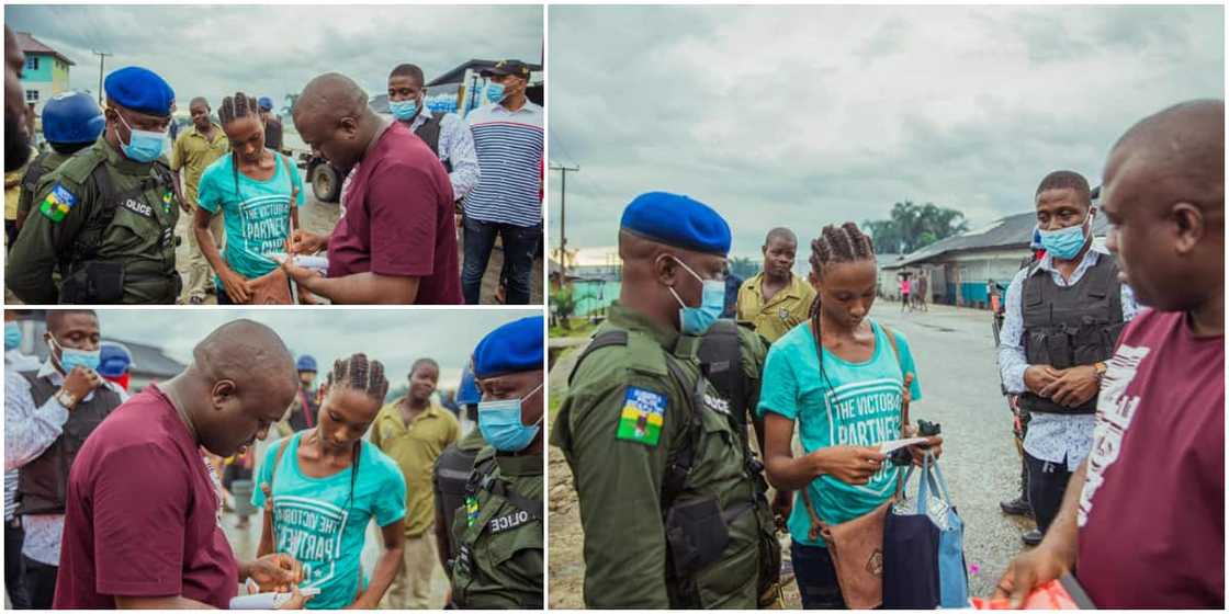 Reactions as Nigerian man surprises lady N500k for her calmness after his car mistakenly splashed water on her