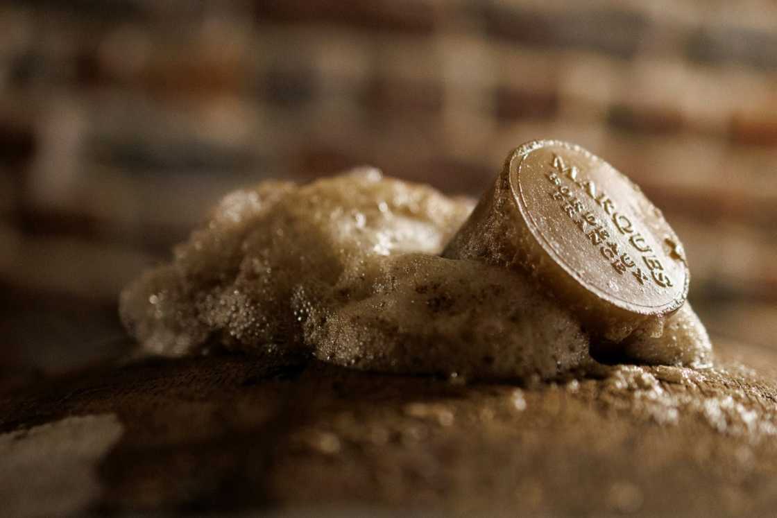 Foam coming from a barrel containing 