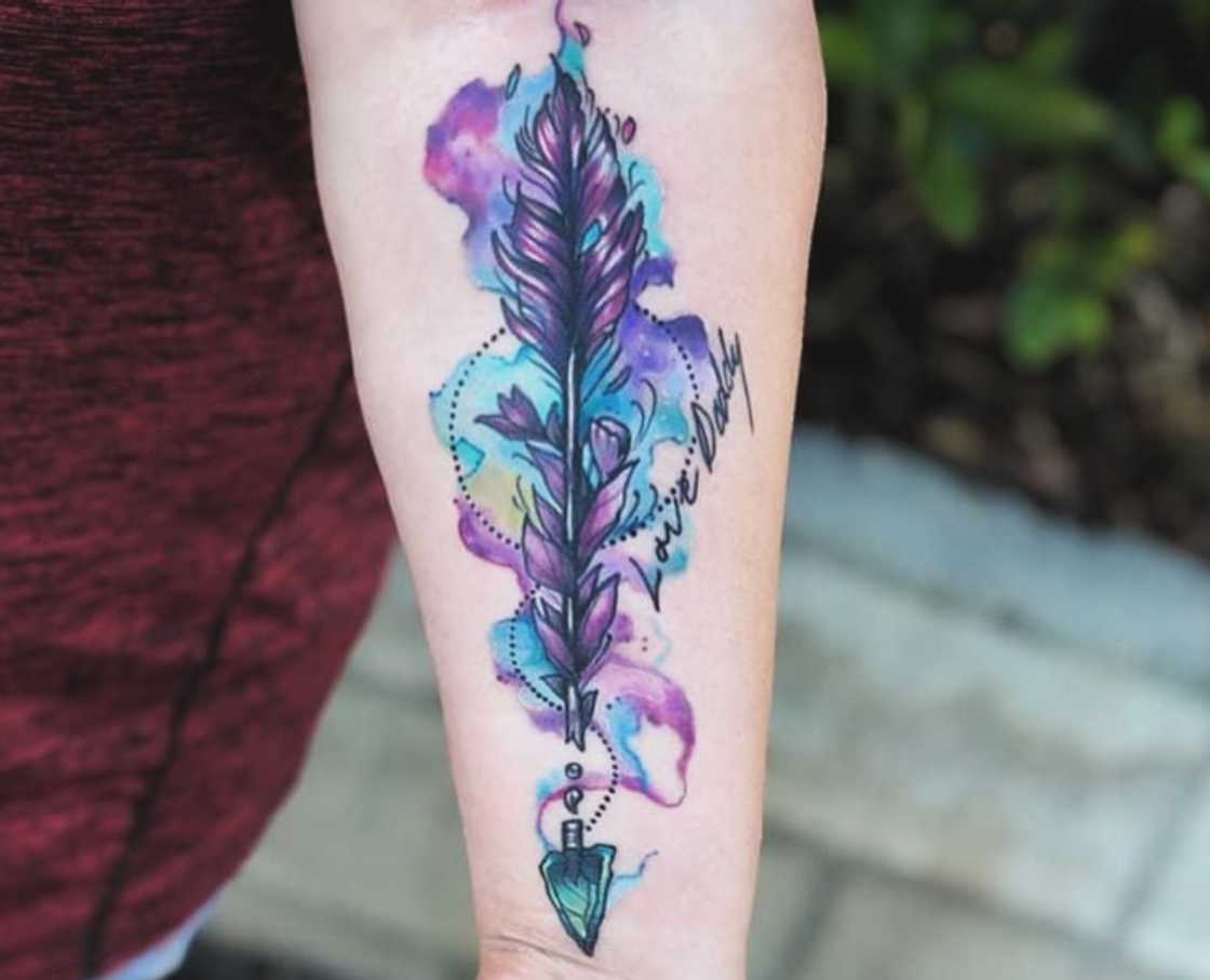 Watercolor arrow tattoo