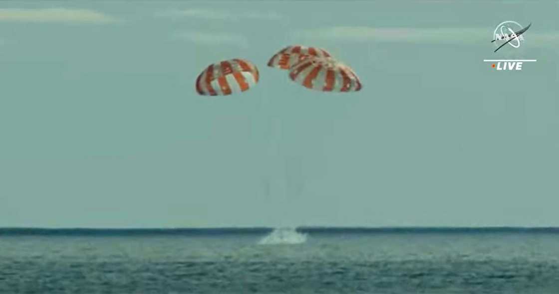 In this still image taken from NASA TV, NASA's unmanned Orion spaceship splashes down in the Pacific Ocean off Baja California, Mexico, on December 11, 2022 In this still image taken from NASA TV, NASA's unmanned Orion spaceship splashes down in the Pacific Ocean off Baja California, Mexico, on December 11, 2022