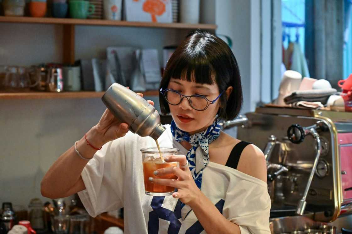 A former journalist, Nguyen Thi Hue now thrives in Hanoi's dynamic coffee industry