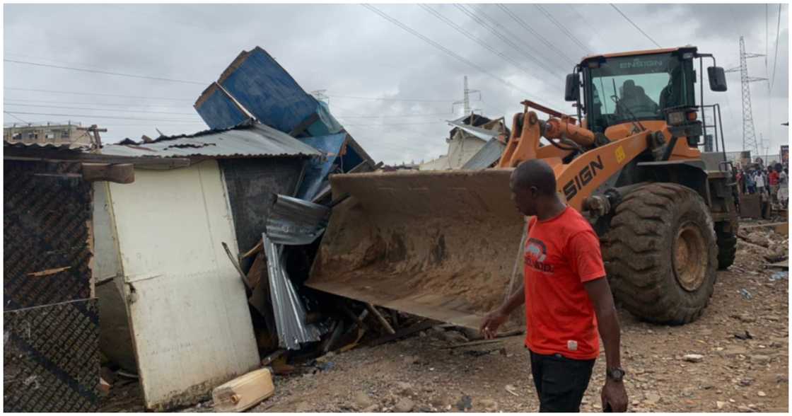 The demolishing of illegal structures by GRIDCo The demolishing of illegal structures by GRIDCo