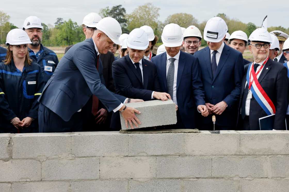 'Defence industries will play a growing role,' said French President Emmanuel Macron (centre) 'Defence industries will play a growing role,' said French President Emmanuel Macron (centre)