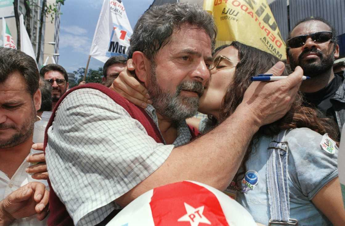Brazilian presidential candidate Luiz Inacio Lula da Silva (L) is kissed in October 1998 by a supporter during a rally in Santo Andre, near Sao Paulo, Brazil Brazilian presidential candidate Luiz Inacio Lula da Silva (L) is kissed in October 1998 by a supporter during a rally in Santo Andre, near Sao Paulo, Brazil