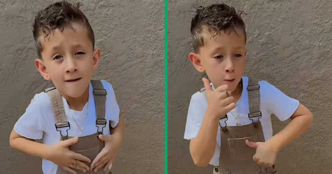A TikTok video shows a little boy dancing. A TikTok video shows a little boy dancing.