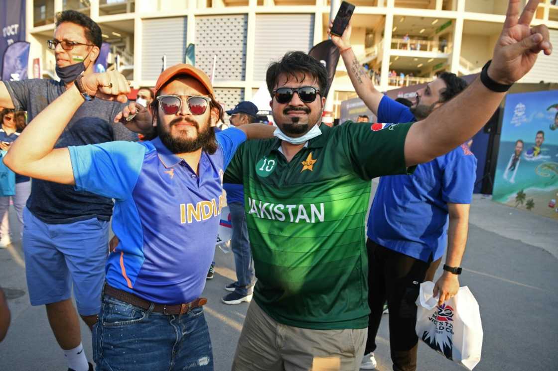An Indian and Pakistan fan share a moment before their teams met in a group match of the Twenty20 World Cup in Dubai in October 2021 An Indian and Pakistan fan share a moment before their teams met in a group match of the Twenty20 World Cup in Dubai in October 2021