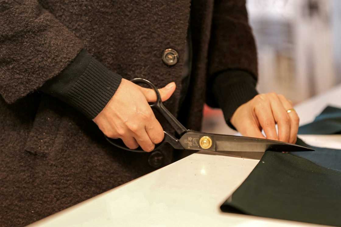 Cutting cloth: Alaa Adel, a graduate of the University of Baghdad who specialised in fashion and design, wanted to create her own fashion house Cutting cloth: Alaa Adel, a graduate of the University of Baghdad who specialised in fashion and design, wanted to create her own fashion house