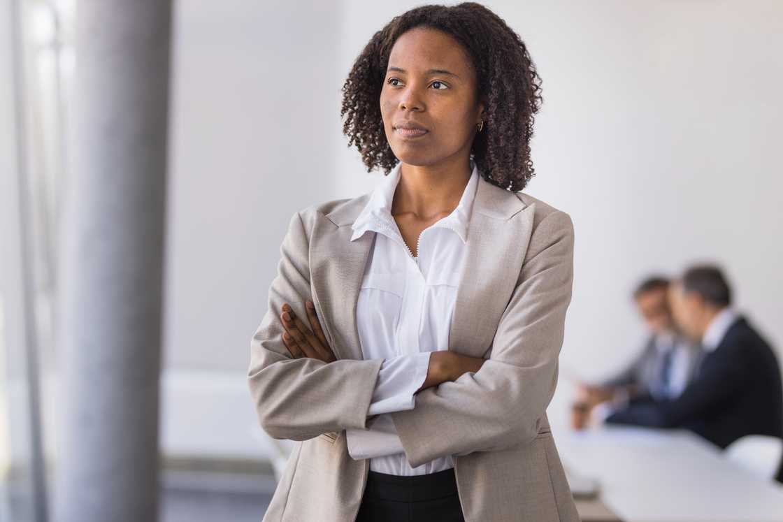 Confident black businesswoman standing