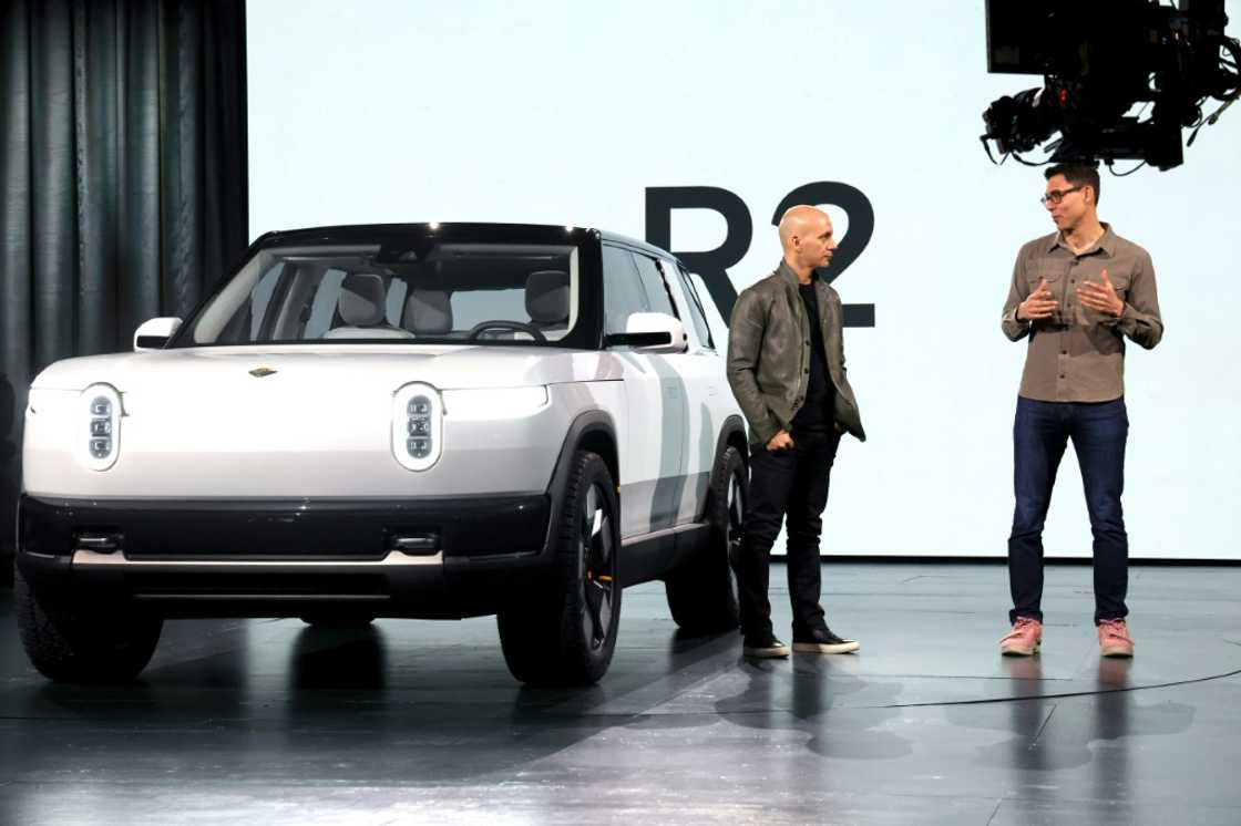 Electric vehicle maker Rivian and Volkswagen announced a joint venture in which the German company will invest $5 billion in the American automaker Electric vehicle maker Rivian and Volkswagen announced a joint venture in which the German company will invest $5 billion in the American automaker