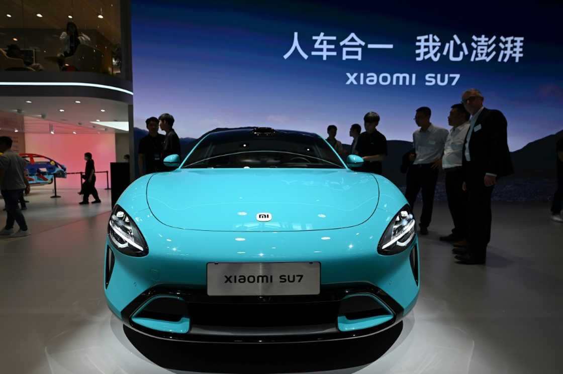 The consumer tech giant is the latest entrant to China's cut-throat EV market, with its new SU7 model the star of the show The consumer tech giant is the latest entrant to China's cut-throat EV market, with its new SU7 model the star of the show