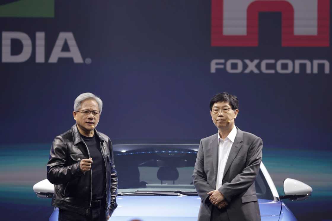 Chairman of Foxconn Technology Group Young Liu (R) and Nvidia CEO Jensen Huang Taiwanese announced Wednesday they are building 'AI factories'