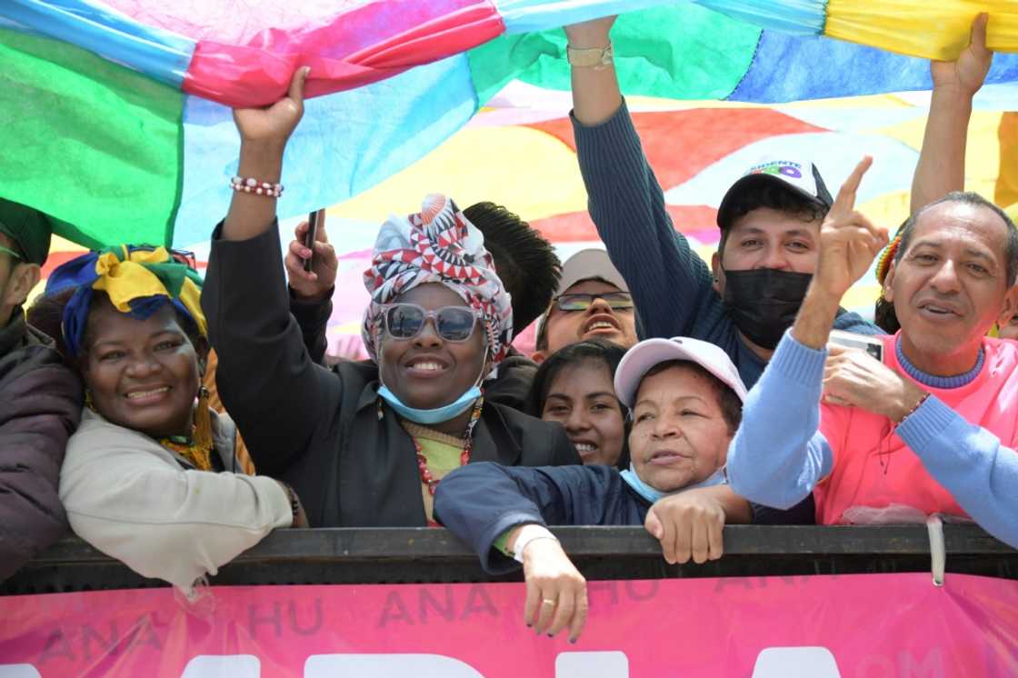 Supporters of the Colombian President-elect Gustavo Petro celebrate before his inauguration ceremony at the Bolivar square in Bogota, on August 7, 2022