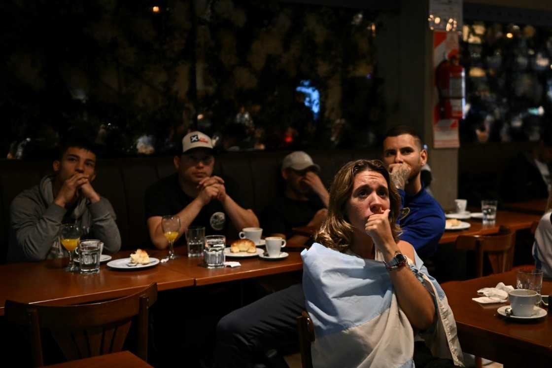 Argentines gathered at breakfast to watch the early morning match Argentines gathered at breakfast to watch the early morning match