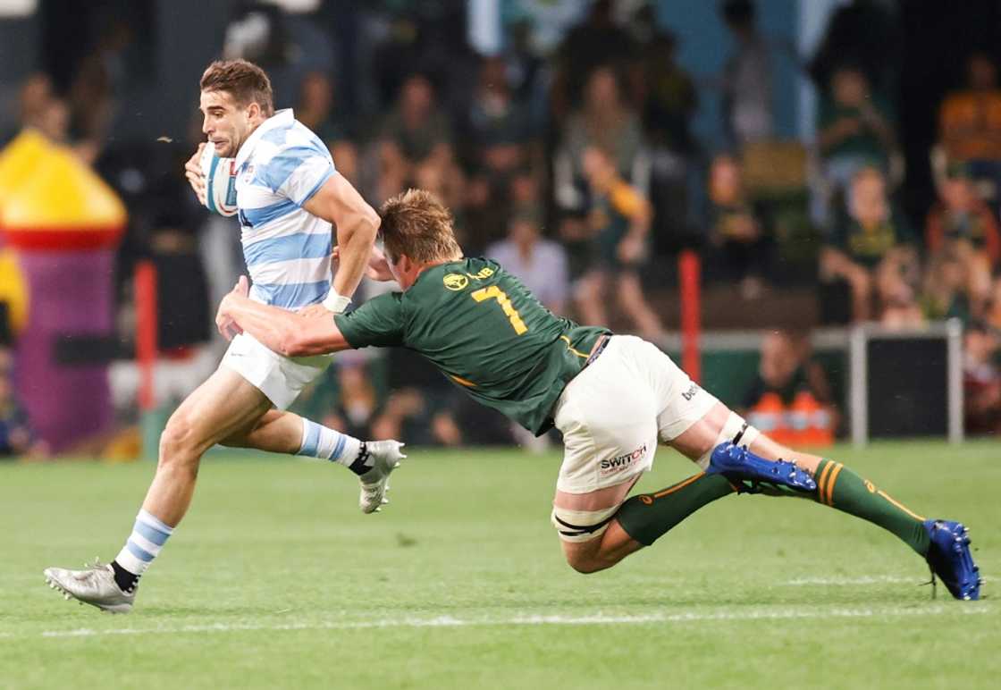 South Africa flanker Pieter-Steph du Toit (R) tackles Argentina full-back Juan Cruz Mallia during a Rugby Championship match in Durban on September 24, 2022. South Africa flanker Pieter-Steph du Toit (R) tackles Argentina full-back Juan Cruz Mallia during a Rugby Championship match in Durban on September 24, 2022.