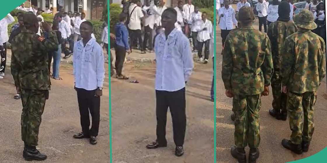 Soldiers celebrate with colleagues who was graduating from school.