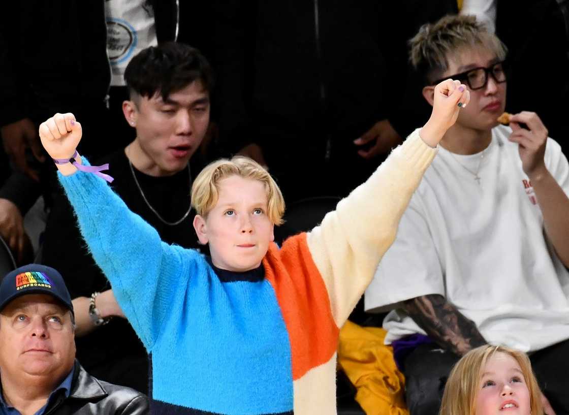Max Corden celebrates at a basketball game between the Los Angeles Lakers and the Los Angeles Clippers. Max Corden celebrates at a basketball game between the Los Angeles Lakers and the Los Angeles Clippers.