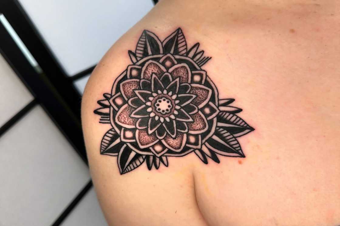 A pair of matching mandalas on the shoulder A pair of matching mandalas on the shoulder