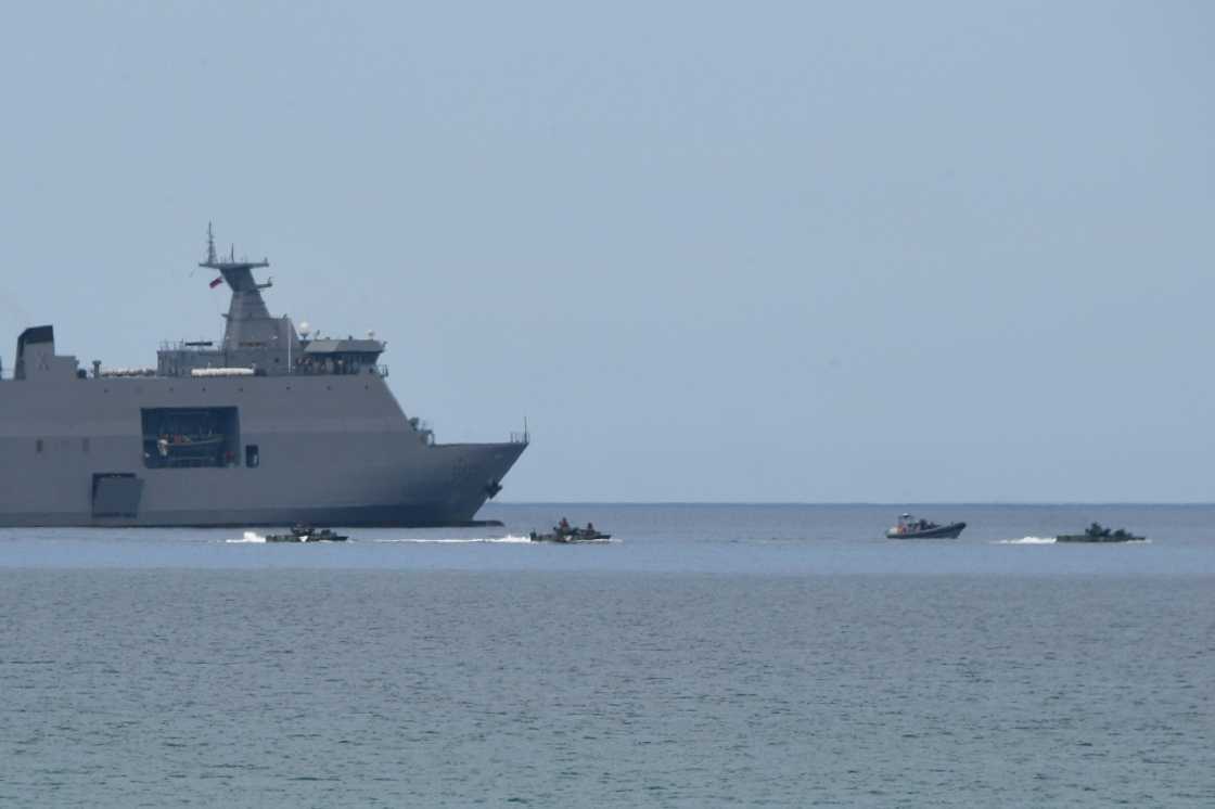 Philippine amphibious assault vehicles manoeuvre next to a BRP Tarlac navy landing platform dock ship Philippine amphibious assault vehicles manoeuvre next to a BRP Tarlac navy landing platform dock ship