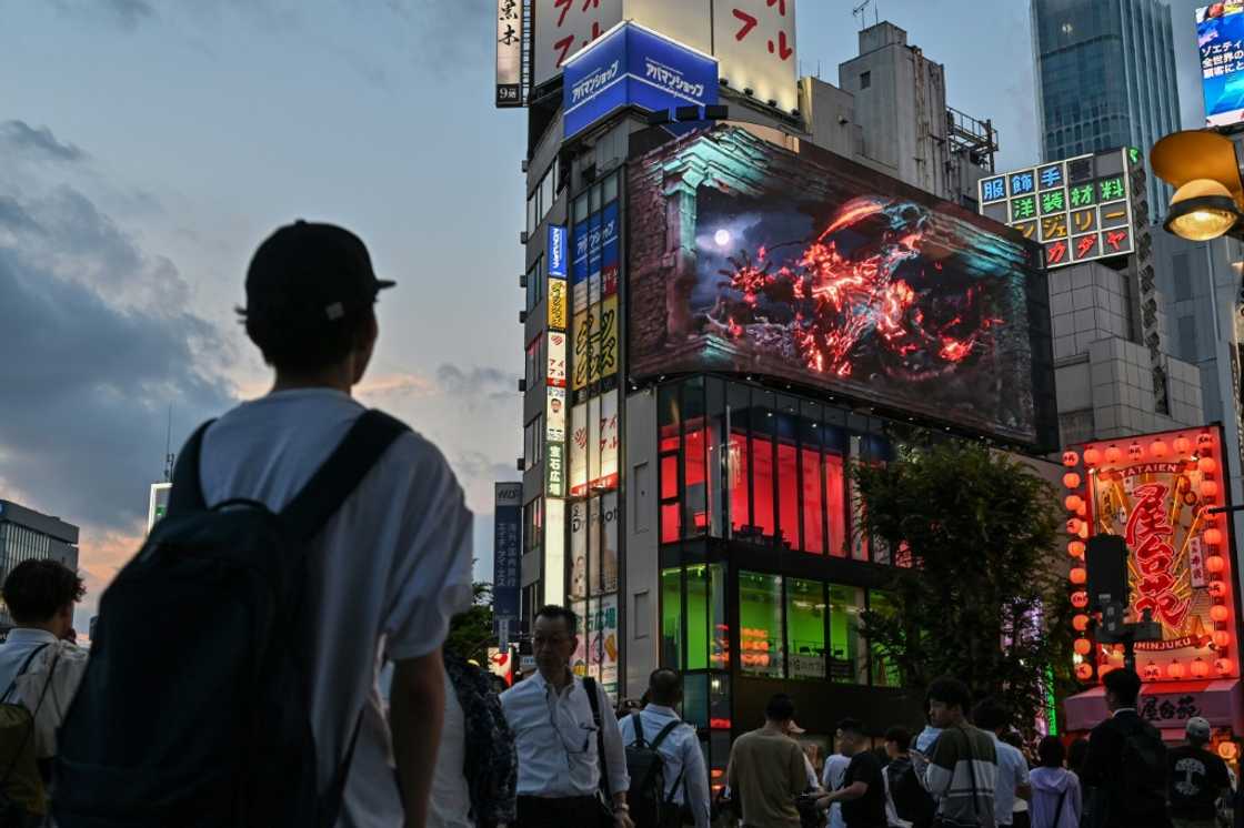 Final Fantasy XVI, seen advertised on a digital screen in Tokyo, has been described as the most grown up edition of the hit series yet Final Fantasy XVI, seen advertised on a digital screen in Tokyo, has been described as the most grown up edition of the hit series yet