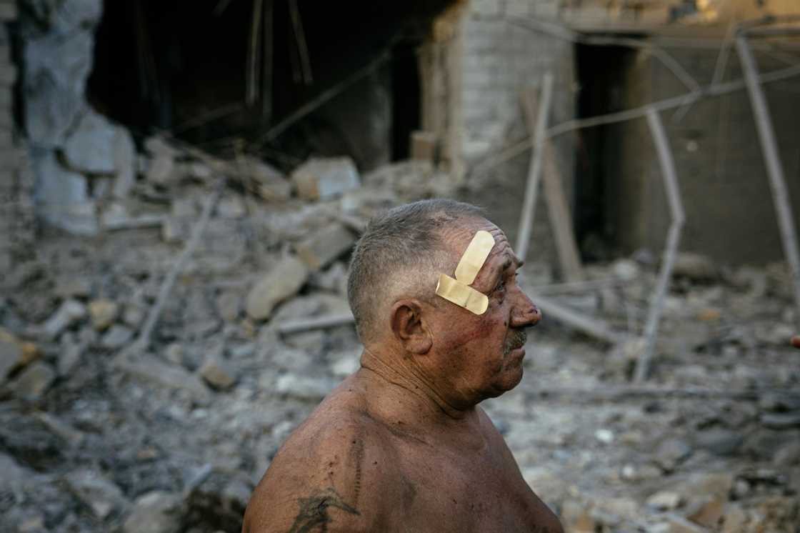 Oleksandr Shulga looks at his destroyed house following a missile strike in Mykolaiv on August 29, 2022 Oleksandr Shulga looks at his destroyed house following a missile strike in Mykolaiv on August 29, 2022