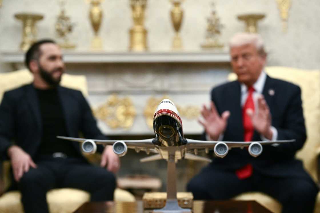 A model of a proposed redesign of Air Force One sits on Trump's coffee table in the Oval Office A model of a proposed redesign of Air Force One sits on Trump's coffee table in the Oval Office