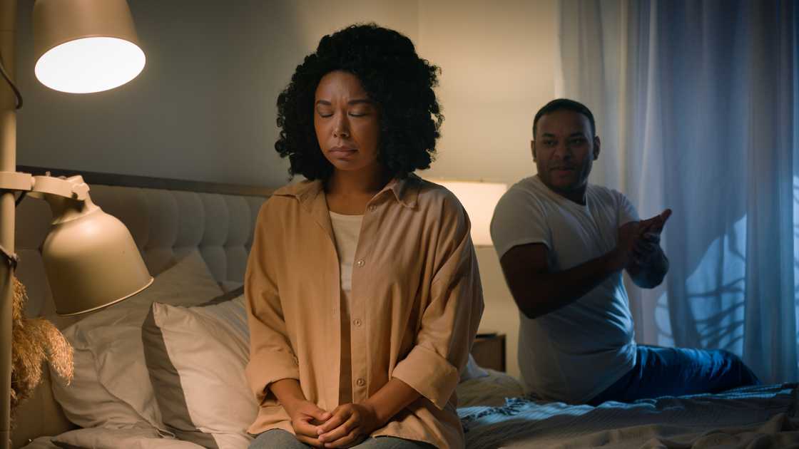 A couple quarrels in the bedroom. A couple quarrels in the bedroom.