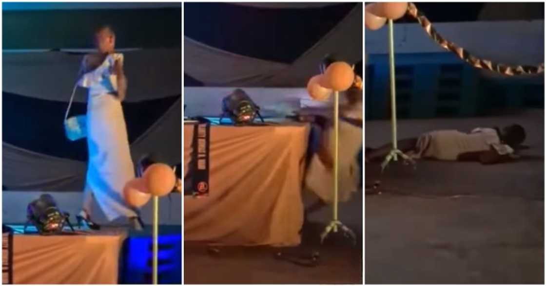 Model falls off stage.