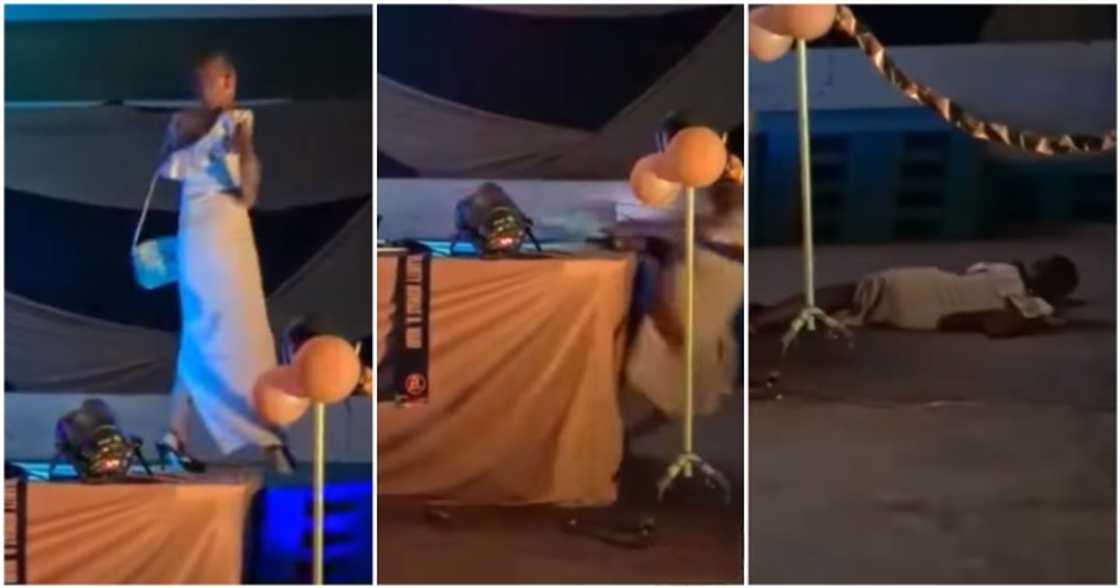 Model falls off stage. Model falls off stage.