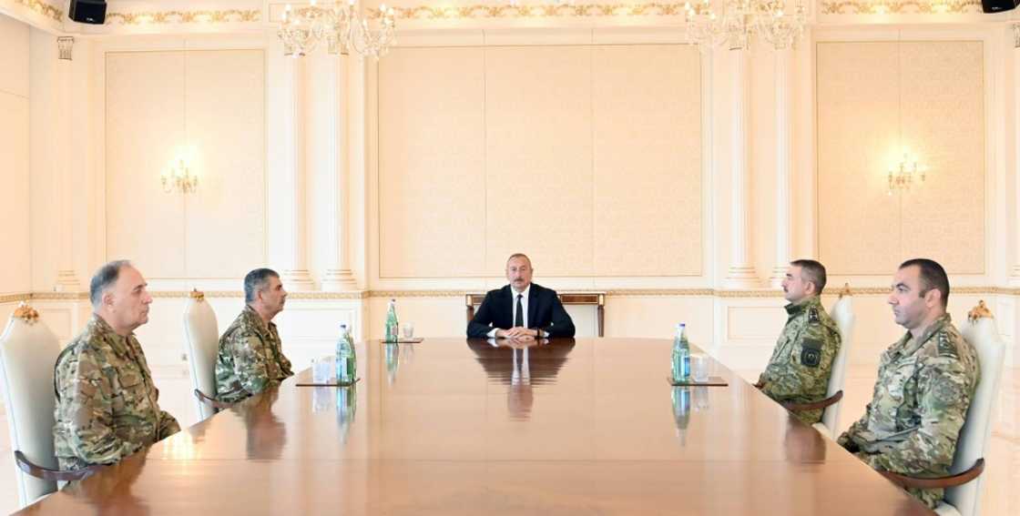 Azerbaijan, whose President Ilham Aliyev met military leaders Tuesday, said it was responding to "large-scale subversive acts" by Armenia Azerbaijan, whose President Ilham Aliyev met military leaders Tuesday, said it was responding to "large-scale subversive acts" by Armenia