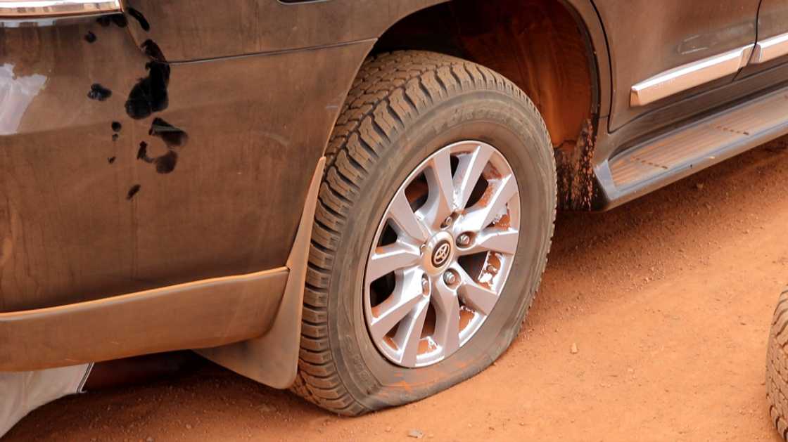 Bad roads at Sissala causes flat tire of Roads and Highways Minister's Land Cruiser