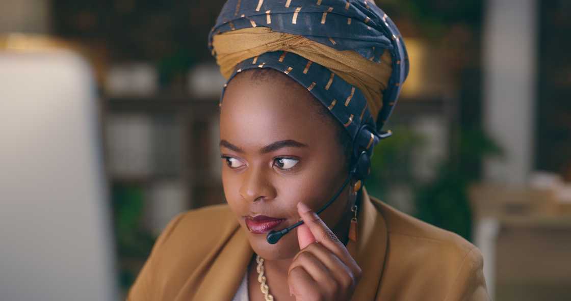 A call centre agent speaks gently during a live customer call.