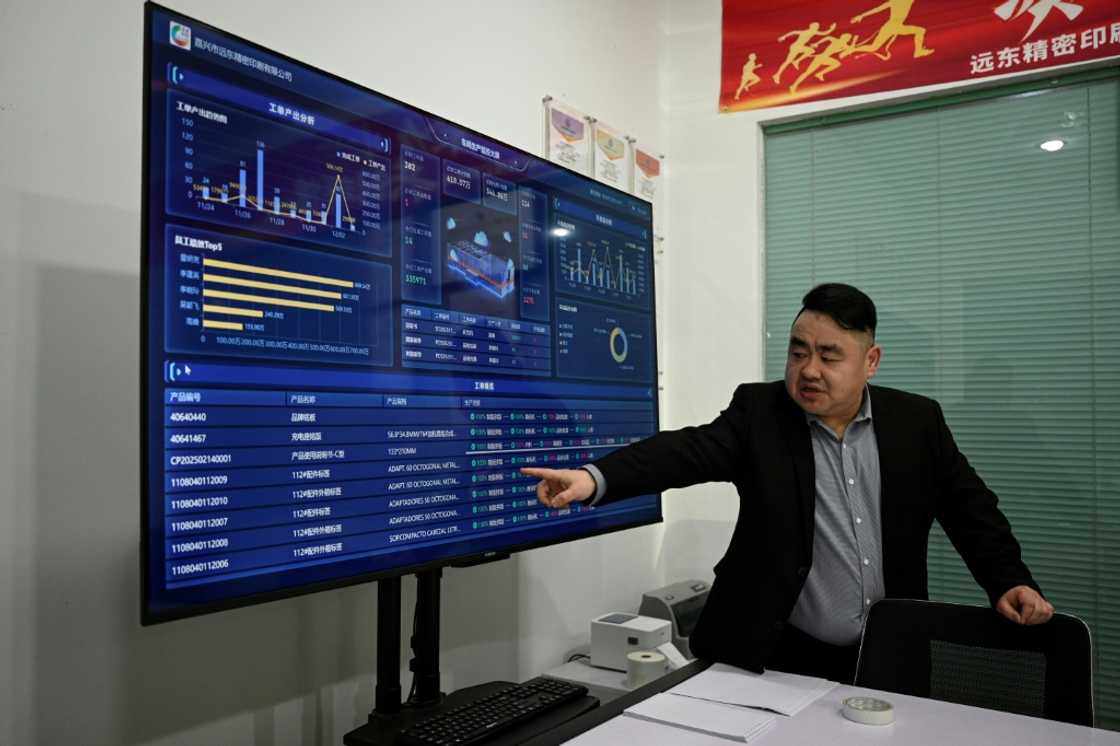 Zhou Yuxiang, the CEO of Black Lake Technologies -- the start-up that provided the software for Zhu's factory -- said he thinks factories would "always be hybrid" Zhou Yuxiang, the CEO of Black Lake Technologies -- the start-up that provided the software for Zhu's factory -- said he thinks factories would "always be hybrid"