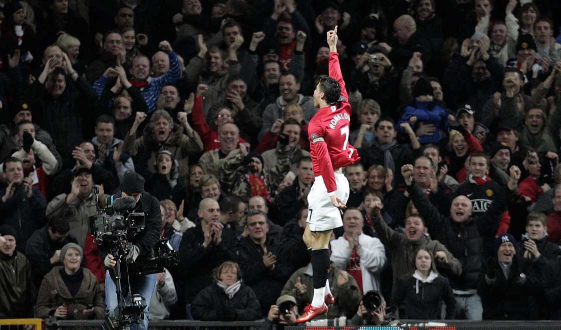 Cristiano Ronaldo of Portugal celebrates scoring against Bolton Wanderers during their English Premier League football match at Old Trafford in manchester, north west England, March 19, 2008 Cristiano Ronaldo of Portugal celebrates scoring against Bolton Wanderers during their English Premier League football match at Old Trafford in manchester, north west England, March 19, 2008