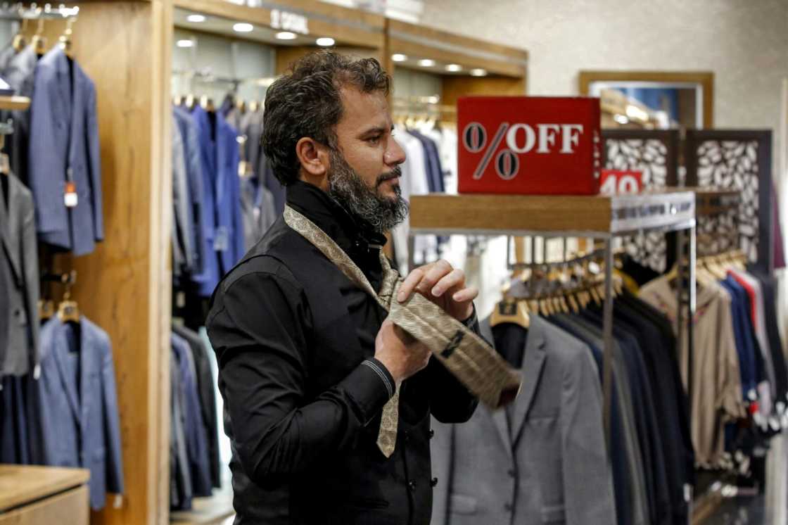 The necktie is making a timid return to upmarket clothing stores in well-to-do north Tehran The necktie is making a timid return to upmarket clothing stores in well-to-do north Tehran