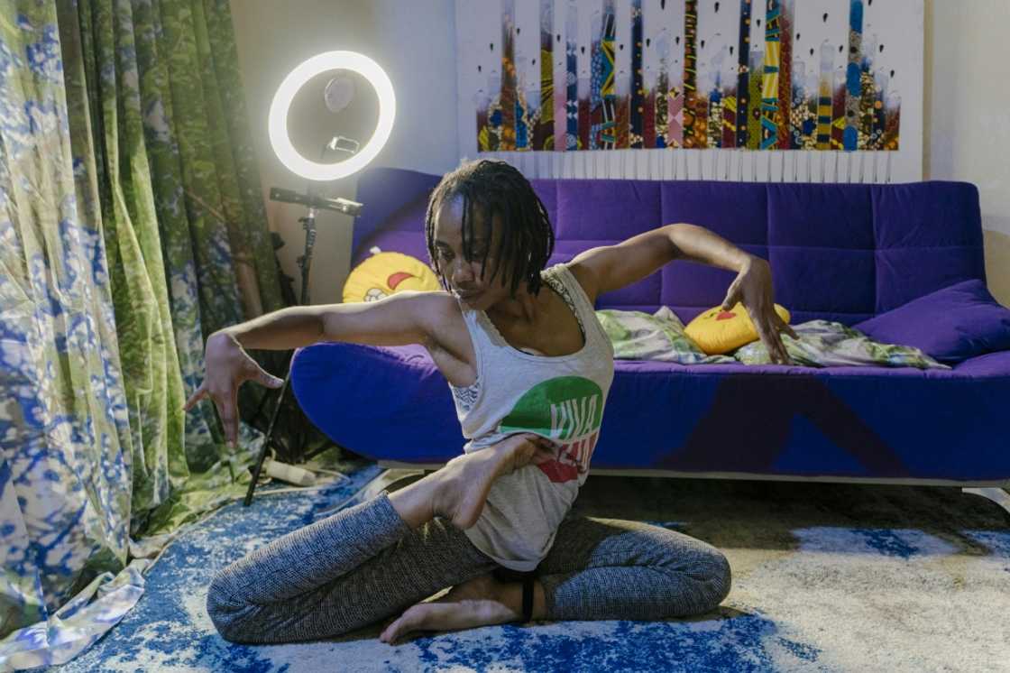 Thiam limbering up at her home in Ngor village Thiam limbering up at her home in Ngor village