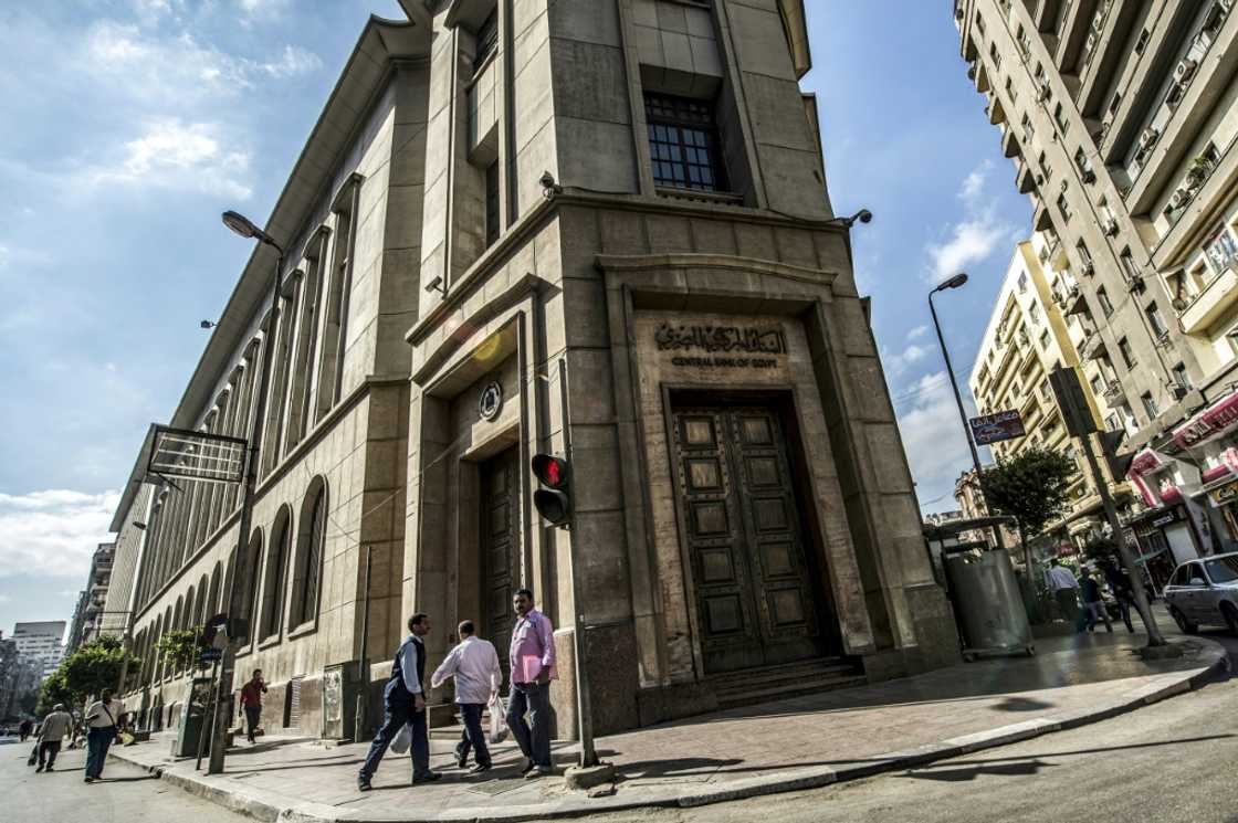 The central bank in downtown Cairo -- Egyptians are again shouldering hardships that come with IMF-backed reforms The central bank in downtown Cairo -- Egyptians are again shouldering hardships that come with IMF-backed reforms