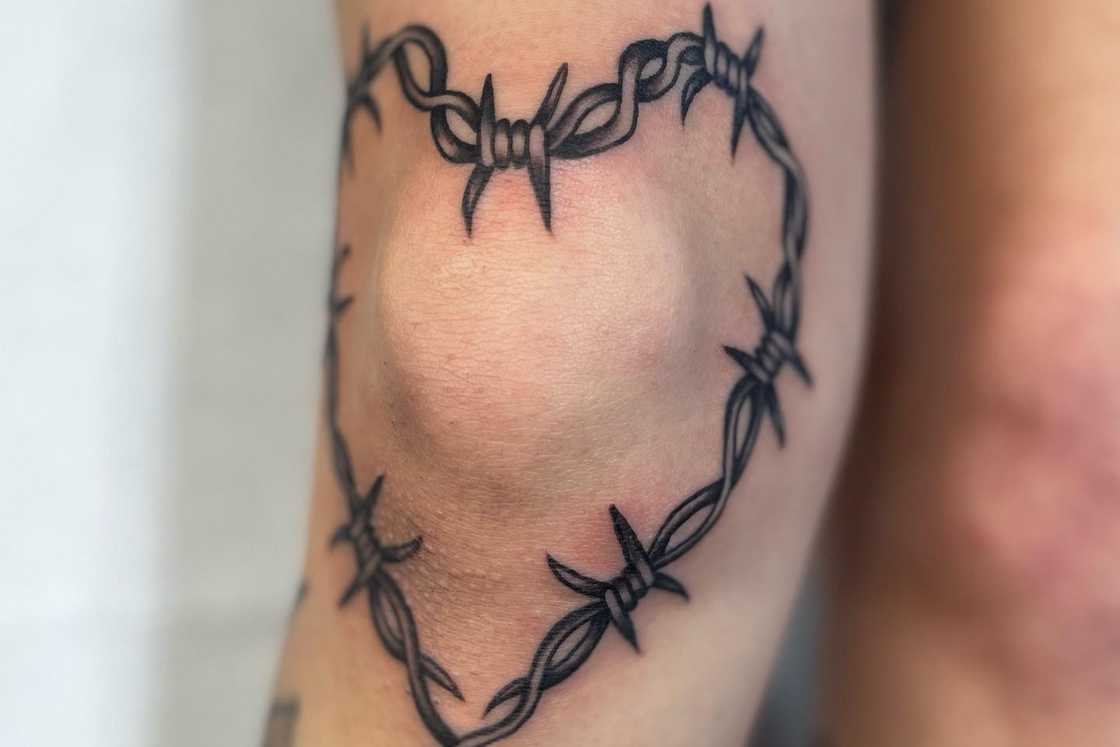 Barbed wire knee tattoo Barbed wire knee tattoo