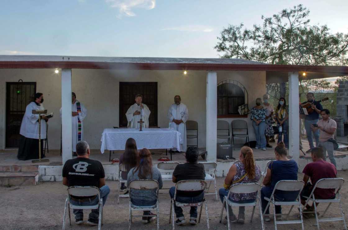 Some of the miners' relatives joined a mass near their improvised camp in the community of Agujita Some of the miners' relatives joined a mass near their improvised camp in the community of Agujita