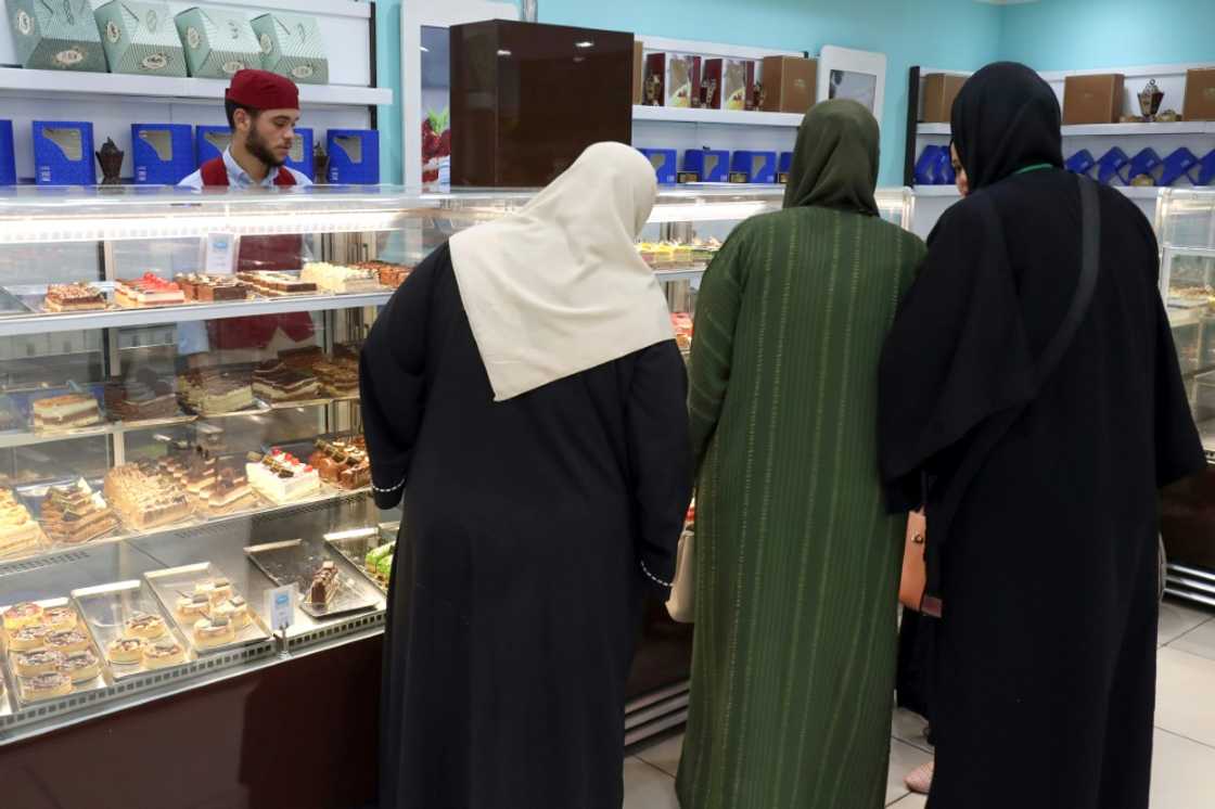 Libyans shop for confectionery at a store in Tripoli Libyans shop for confectionery at a store in Tripoli