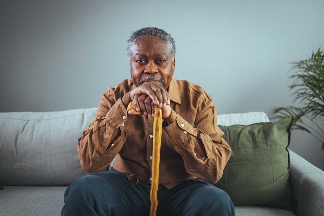 Portrait of a senior man sitting Portrait of a senior man sitting