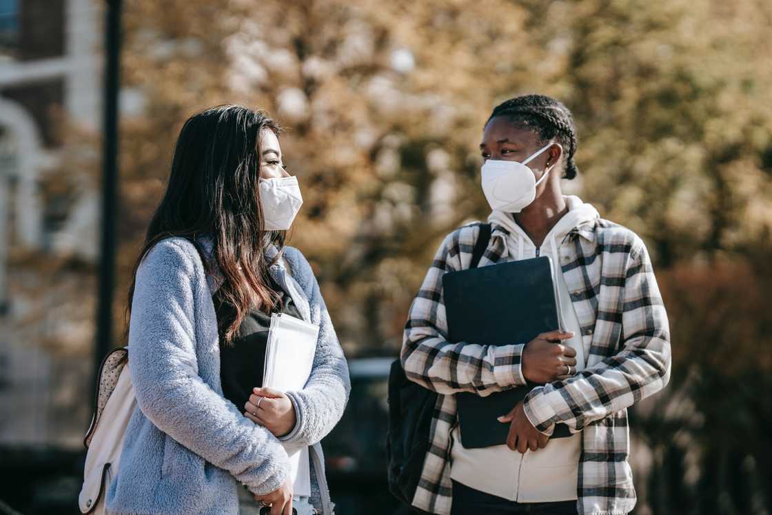 Students talking while walking