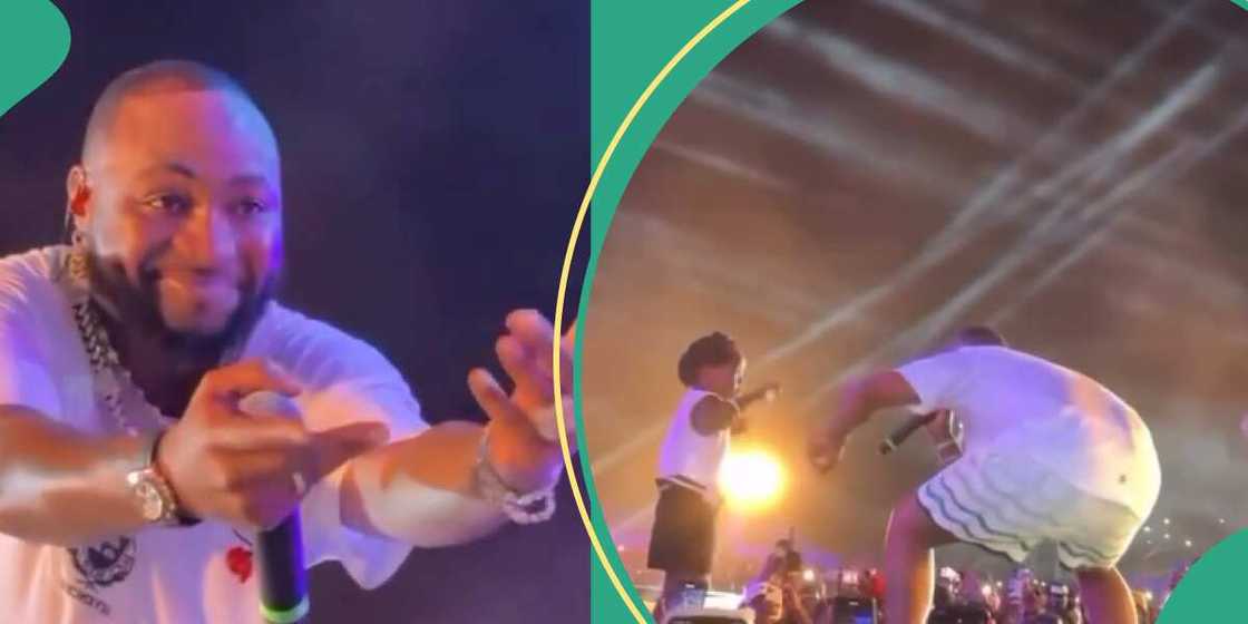 Davido dances with little girl on stage in Uganda. Davido dances with little girl on stage in Uganda.