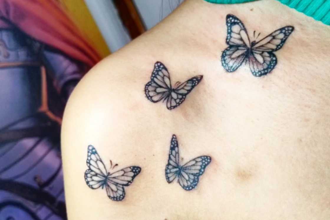 Active butterflies front shoulder tattoo Active butterflies front shoulder tattoo