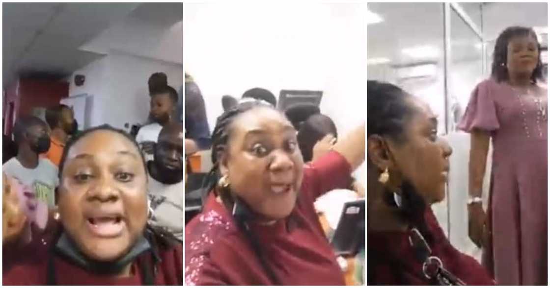 Woman causes stir at a bank, stops bankers from attending to anyone as she demands refund of her N100k, makes live video Woman causes stir at a bank, stops bankers from attending to anyone as she demands refund of her N100k, makes live video